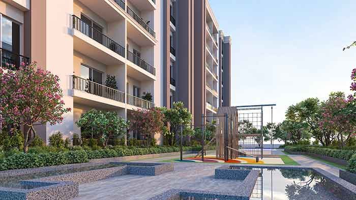 Landscaped courtyard and kids play area at Evara Shades